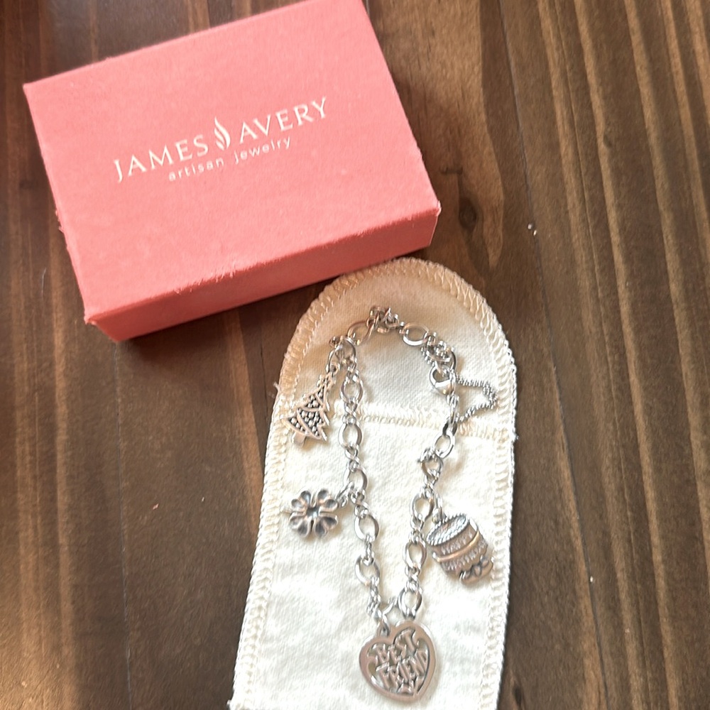 James Avery Silver charm Bracelet with four charms 6 5/8 inch bracelet